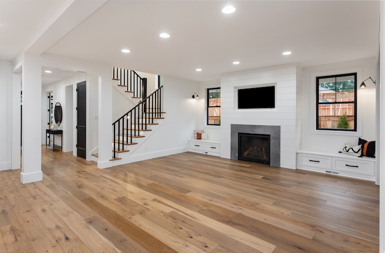 Farmhouse Style Living Room with Hardwood Floors | Jason Wright Electric